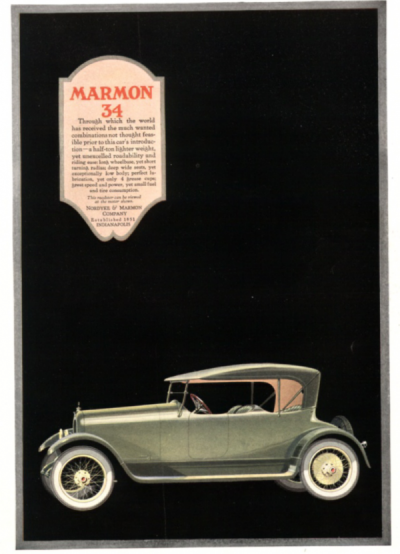1918 Marmon 34 ad. Green automobile on black background.