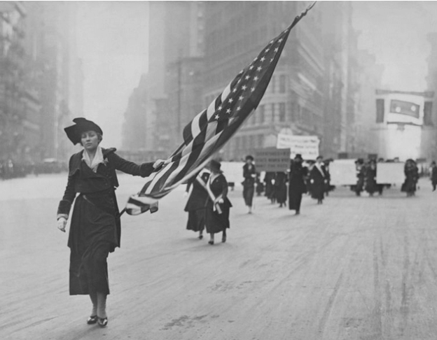 Neysa McMein marching in a suffragist parade, 1917.